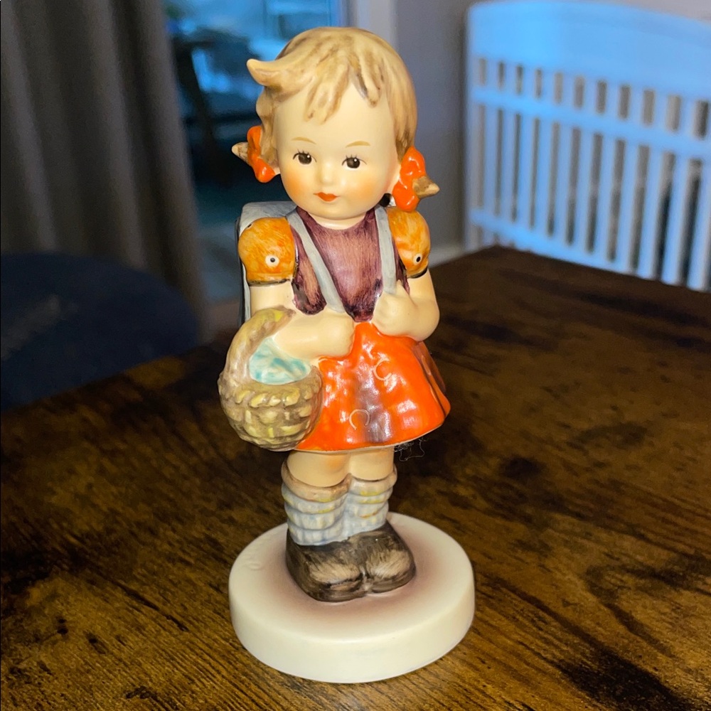 Goebel Figurine with Vibrant Orange and Rich Brown